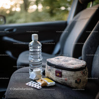 Travel Essentials with Snacks and First Aid Kit in Car