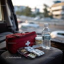 Travel Essentials with Snacks and First Aid Kit in Car