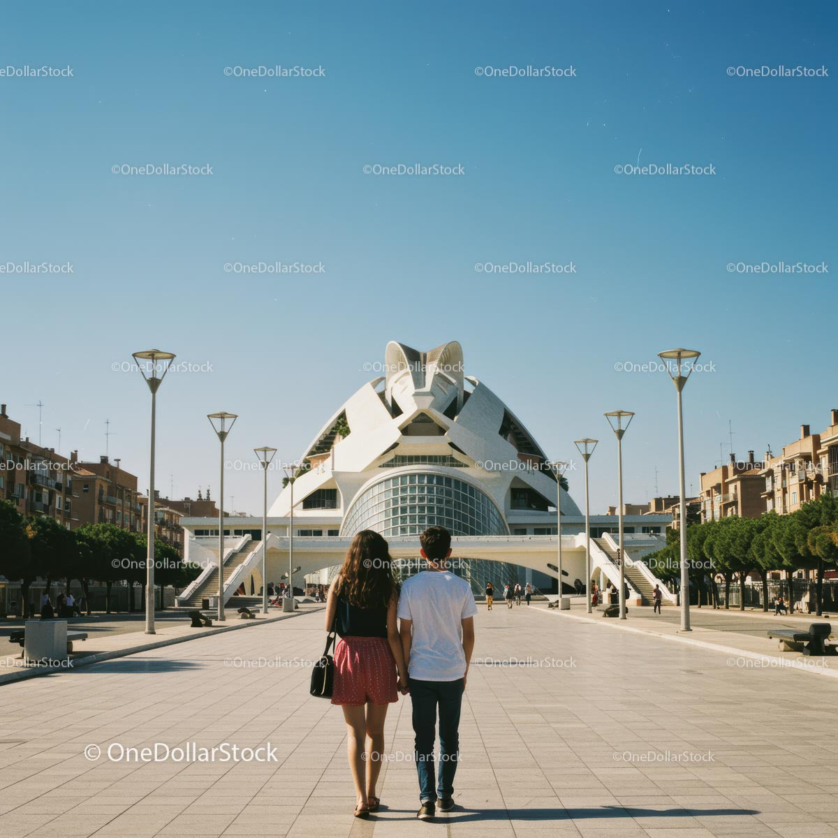 Couple Strolling Towards Futuristic Building in Valencia