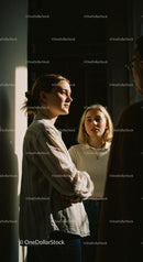 Sunlit Conversation Among Friends Indoors