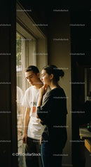 Silhouette of a Young Couple Enjoying a City Night Scene