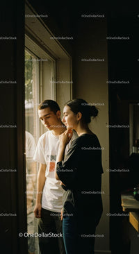 Silhouette of a Young Couple Enjoying a City Night Scene