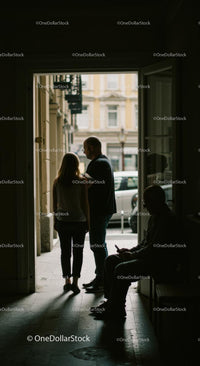 Silhouette of a Young Couple Enjoying a City Night Scene