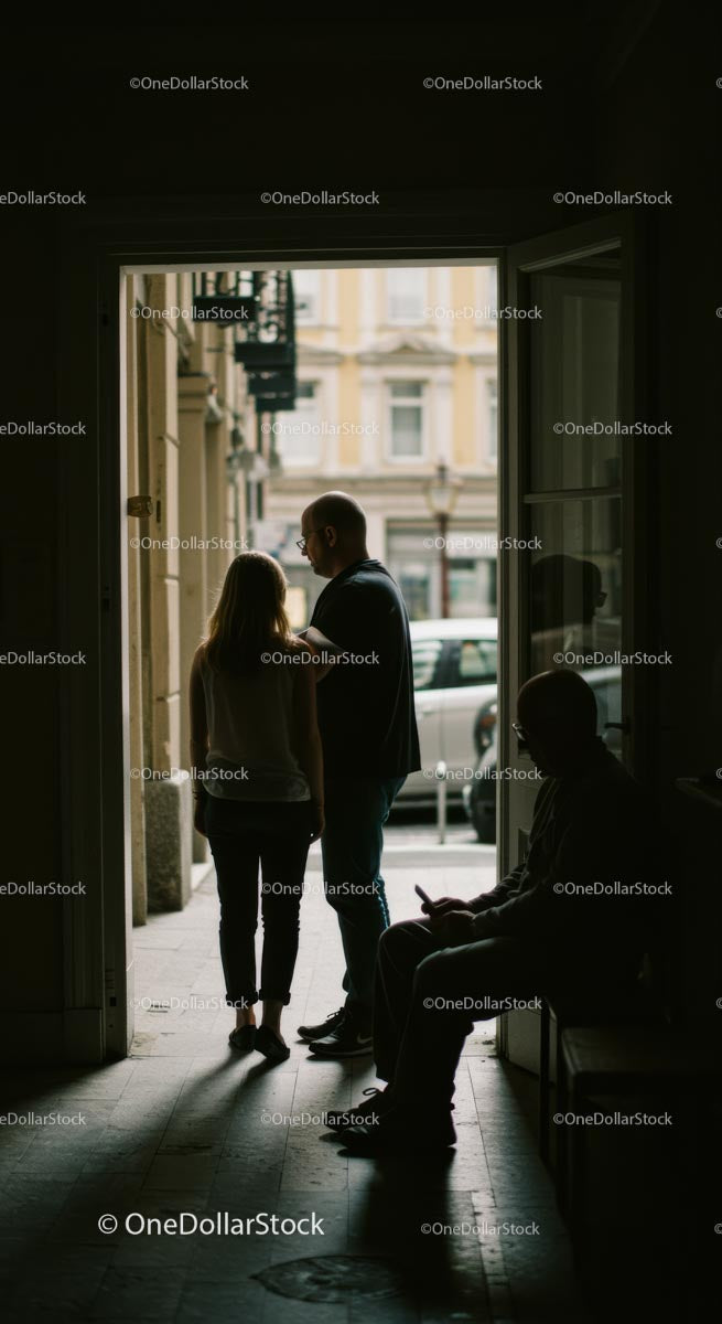 Silhouette of a Young Couple Enjoying a City Night Scene