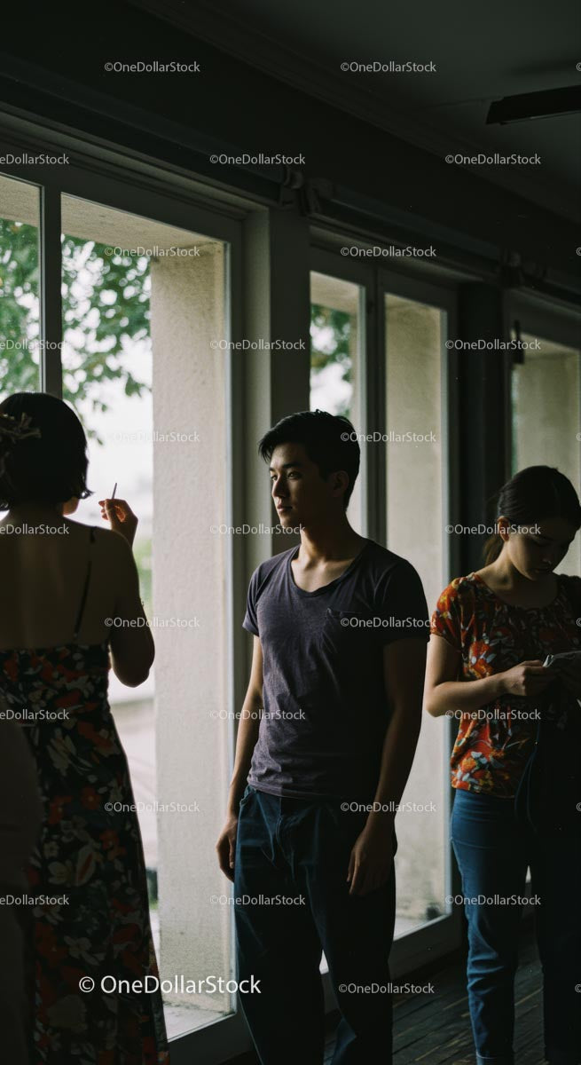Casual Gathering by the Window in Soft Natural Light