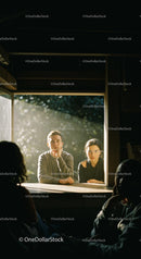 People Conversing by Window in Warm Sunlit Room