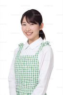 Smiling Woman in Green Gingham Apron
