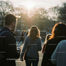 People Walking in Sunlit Urban Park