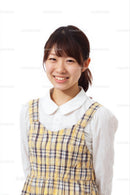 Smiling Woman in a Yellow Plaid Dress