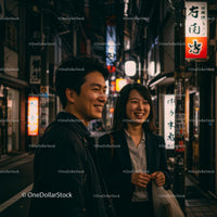 Smiling Friends Strolling in Neon-lit City Street at Night