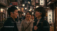 Friends Enjoying a Night Out on a Vibrant City Street