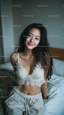 Woman Relaxing in Cozy Bedroom Setting with Natural Light