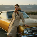Elegant Woman with Vintage Car in Desert Landscape