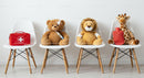 Stuffed Animals and First Aid Kit on Chairs