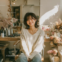 Smiling Woman Surrounded by Dried Flowers in Cozy Setting