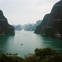 Limestone Cliffs Surrounding a Tranquil Emerald Bay