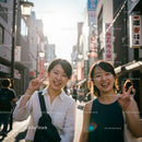 Smiling Friends Exploring a Bustling Urban Street