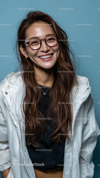 Smiling Woman in Glasses with Long Brown Hair