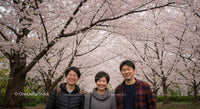 Smiling Friends Under Blooming Cherry Blossoms