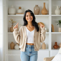 Smiling Woman in Cozy Beige Cardigan at Home