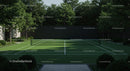 Sunny Outdoor Tennis Court Surrounded by Lush Trees