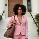 Confident Business Woman in Pink Suit Outside Office