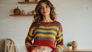 Smiling Woman in Cozy Sweater with Modern Bookshelf