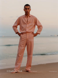 Fashionable Male Model Posing on a Tranquil Beach