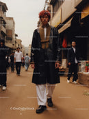Young Man in Fashionable Attire on Bustling Urban Street