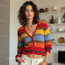 Woman in Striped Multicolored Sweater at Home