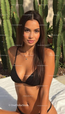 Woman in Black Bikini Relaxing by Green Cactus