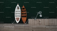 Two Rowing Boats Moored at a Wooden Pier