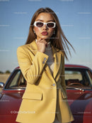 Stylish Woman in Yellow Blazer with Sunglasses