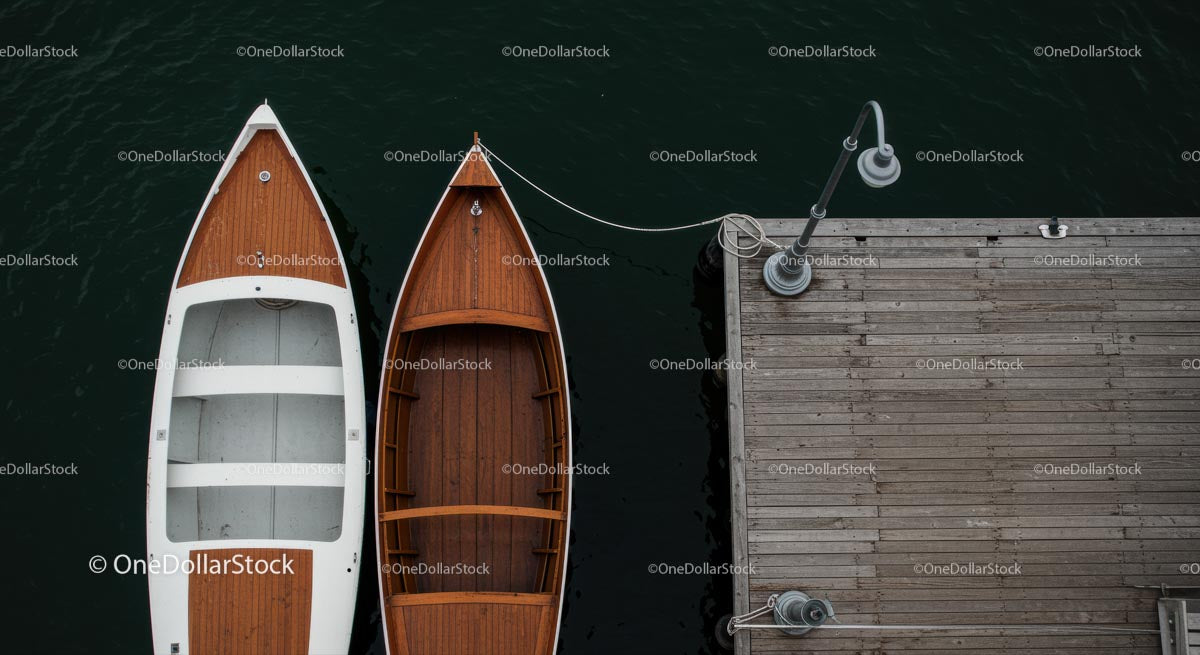 Aerial View of Luxury Yacht Beside Wooden Dock
