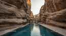Tranquil Pool Amidst Majestic Sandstone Cliffs in Desert Oasis