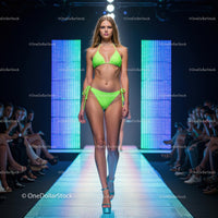 Runway Model in Vibrant Green Bikini at Fashion Show