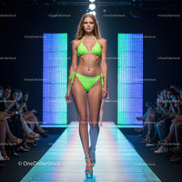 Glamorous Runway Model in Green Bikini at Fashion Show