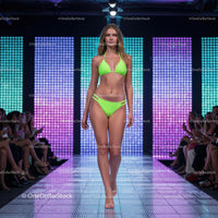 Glamorous Runway Model in Green Bikini at Fashion Show