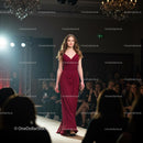 Model in Elegant Red Gown on Fashion Runway