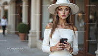 Smiling Woman in Cozy Sweater with Modern Bookshelf