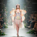 Model in Butterfly Wings on Floral Runway Show