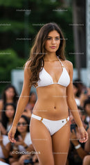 Confident Model in White Bikini on Runway