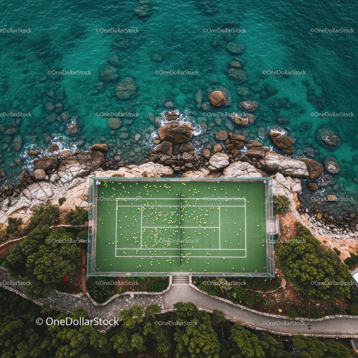 Aerial View of Tennis Court by Turquoise Ocean