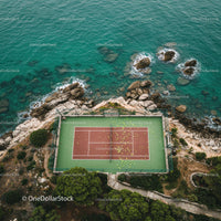 Aerial View of Tennis Court by Turquoise Sea and Rocky Shoreline