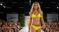 Glamorous Fashion Show with Yellow Bikini Model
