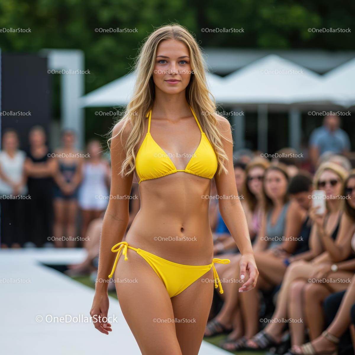 Model Wearing Yellow Bikini on Fashion Runway