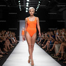 Runway Model Showcasing Orange Swimsuit at Fashion Show