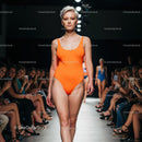 Glamorous Runway Model in Green Bikini at Fashion Show
