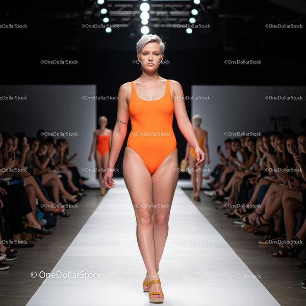 Fashion Model in Orange Swimsuit on Runway