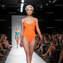 Glamorous Runway Model in Green Bikini at Fashion Show